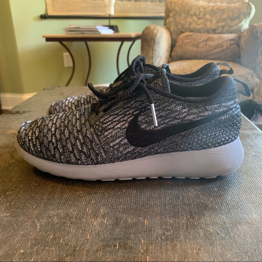 Grey and black Nike fly knit shoes